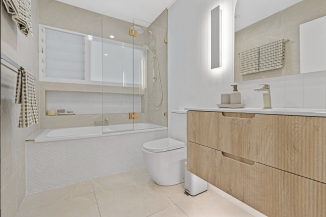 Luxury bathroom renovation with premium tiling and tapware
